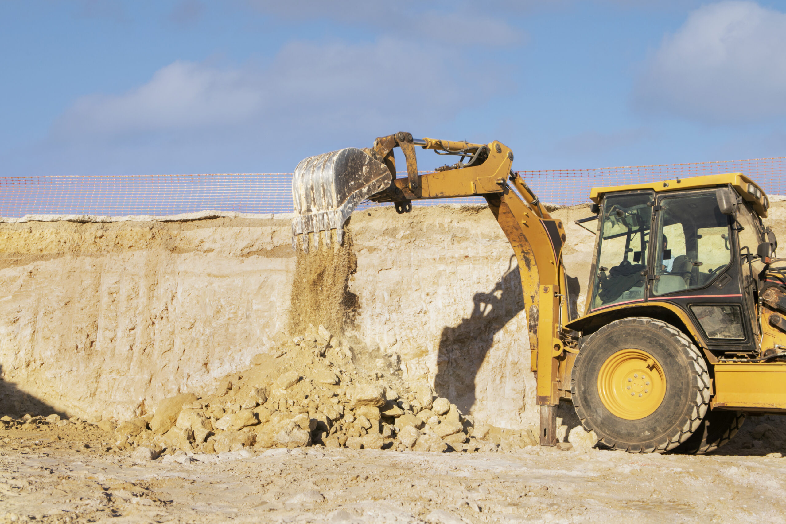 excavator-digging-ground-day-light